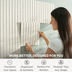 Woman installing felt wall tiles on home office wall — modular bulletin board no tools needed